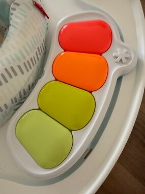 Skip Hop activity center piano attachment